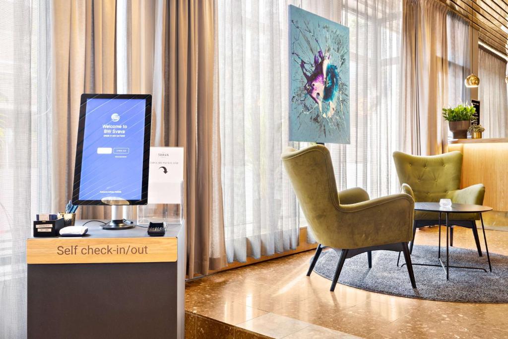 TV a/nebo společenská místnost v ubytování Best Western Hotel Svava