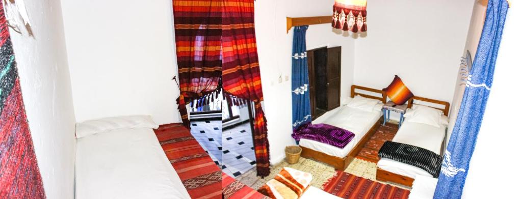 Postel nebo postele na pokoji v ubytování Cordoba Pension