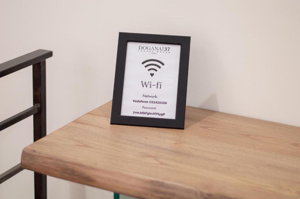 Certyfikat, podpis lub inny dokument wystawiony w obiekcie Luxury House Dogana 37