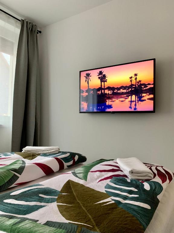 Televízia a/alebo spoločenská miestnosť v ubytovaní Sicomoro Casa