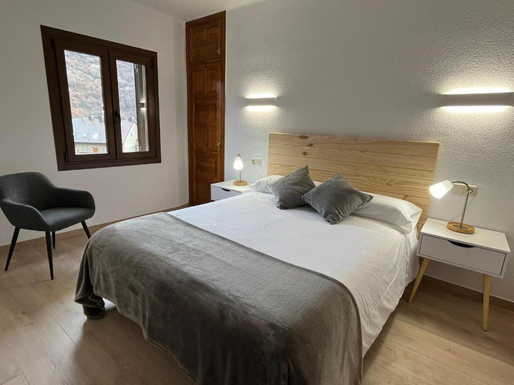 Postel nebo postele na pokoji v ubytování Hotel Farré D'avall