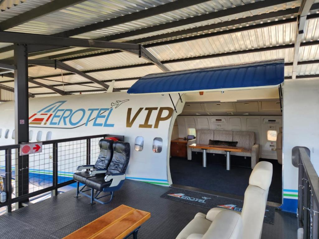 a view of a room with a couch and a table at AEROTEL VIP in Hoedspruit