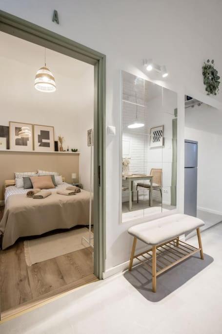 Posteľ alebo postele v izbe v ubytovaní Atelier Apartment