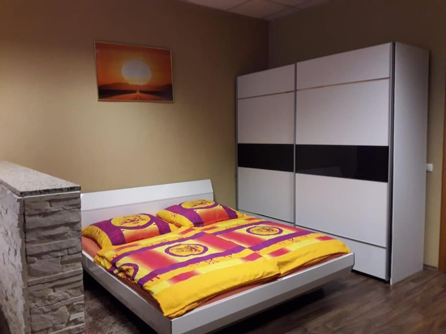 Postel nebo postele na pokoji v ubytování Ferienwohnung Aelit