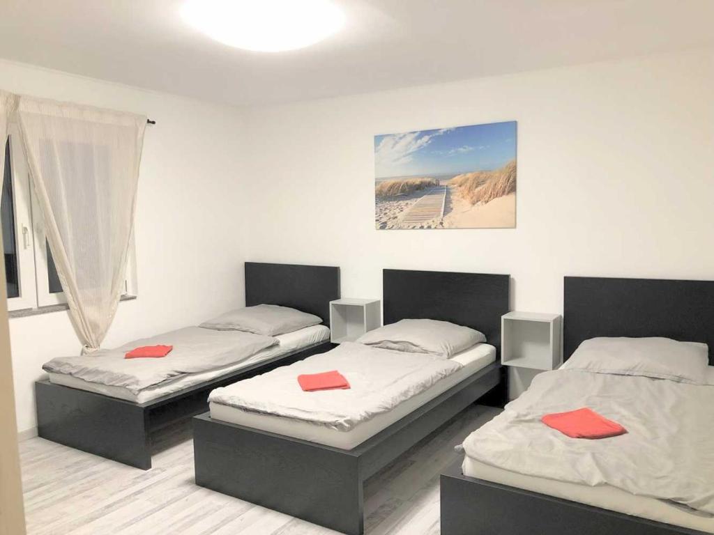 Ένα ή περισσότερα κρεβάτια σε δωμάτιο στο Work & Stay Apartment in Troisdorf