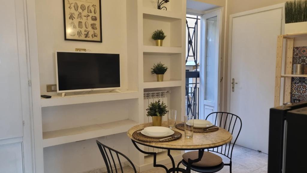 Televízia a/alebo spoločenská miestnosť v ubytovaní CAROLINA'S HOME