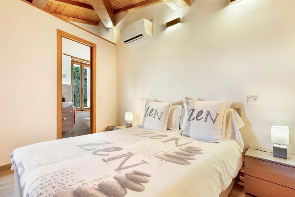 A bed or beds in a room at Tower House with emotional shower