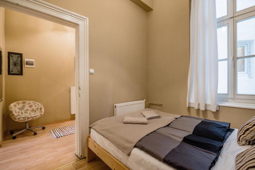 Posteľ alebo postele v izbe v ubytovaní Andrássy 53 2bedroom Center Apartment