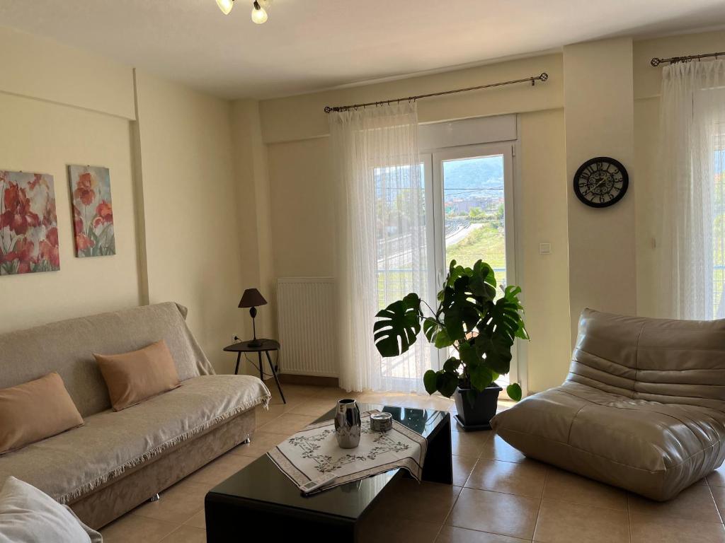 Posezení v ubytování Olympian Two Floor Apartment