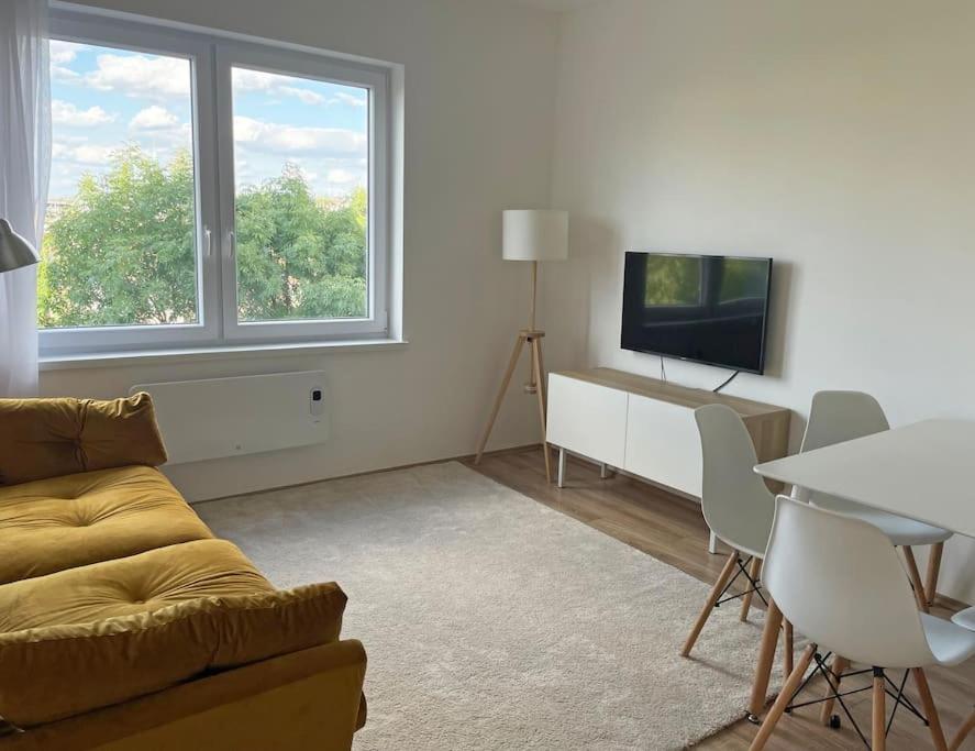 A television and/or entertainment centre at Buda Castle Toldy Apartment