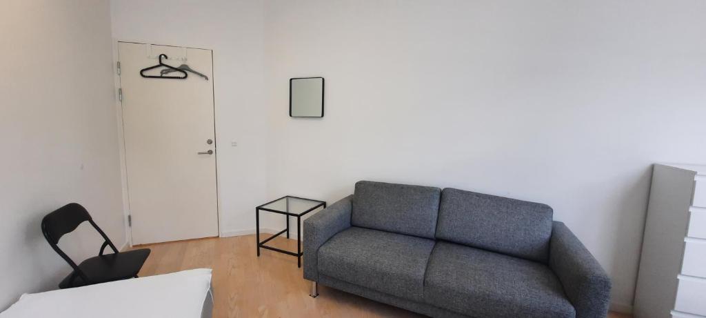 Posezení v ubytování 1- Bed Private room in apartment