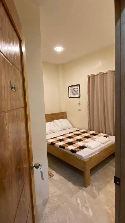 Postel nebo postele na pokoji v ubytování Antelmi Travelers Inn