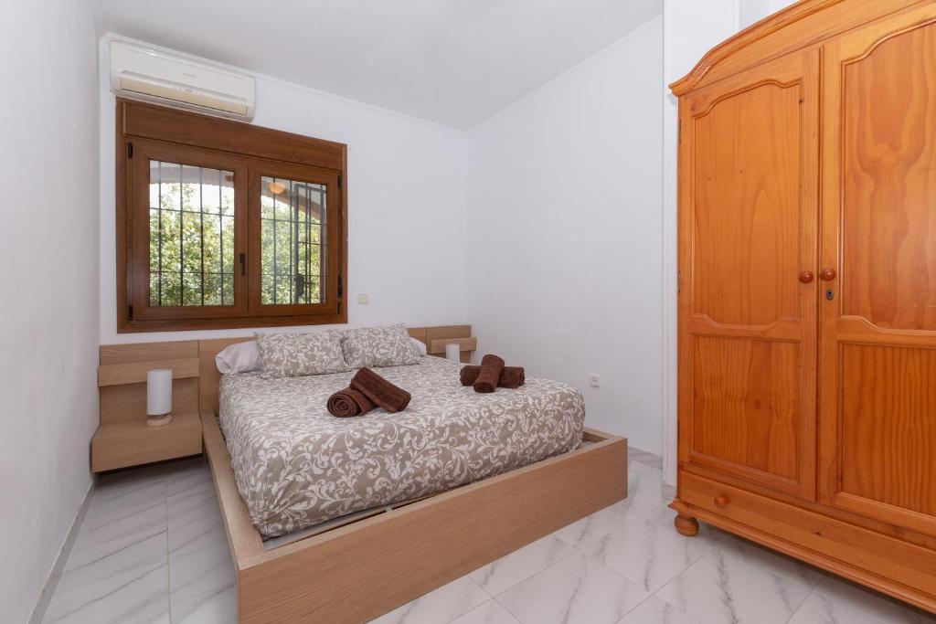 Posteľ alebo postele v izbe v ubytovaní Casa Guadalmar