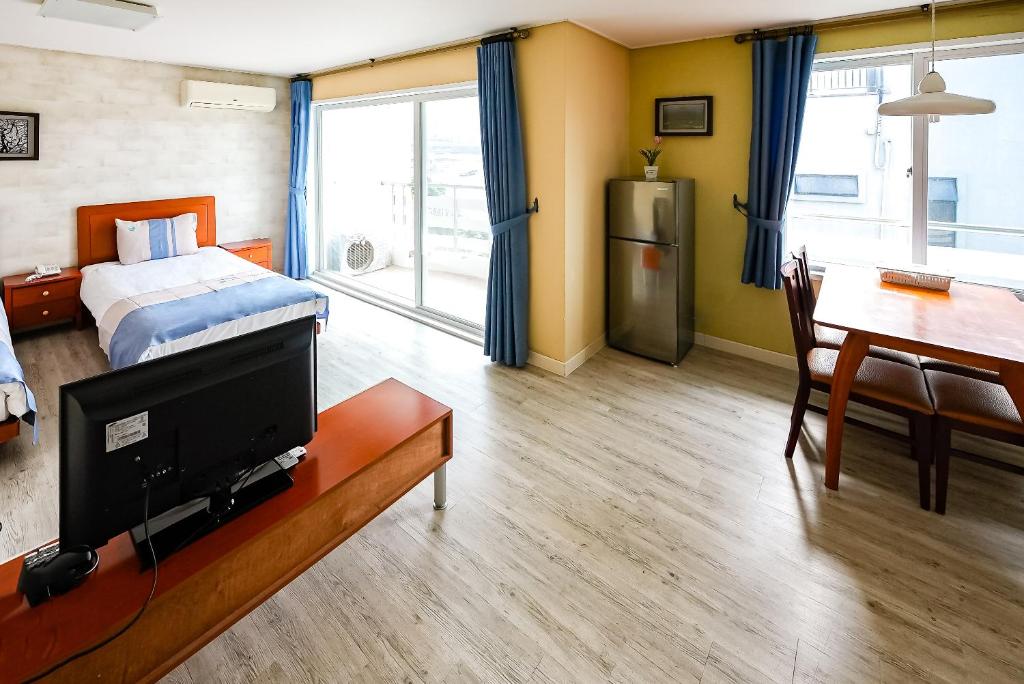Postel nebo postele na pokoji v ubytování Mega Resort