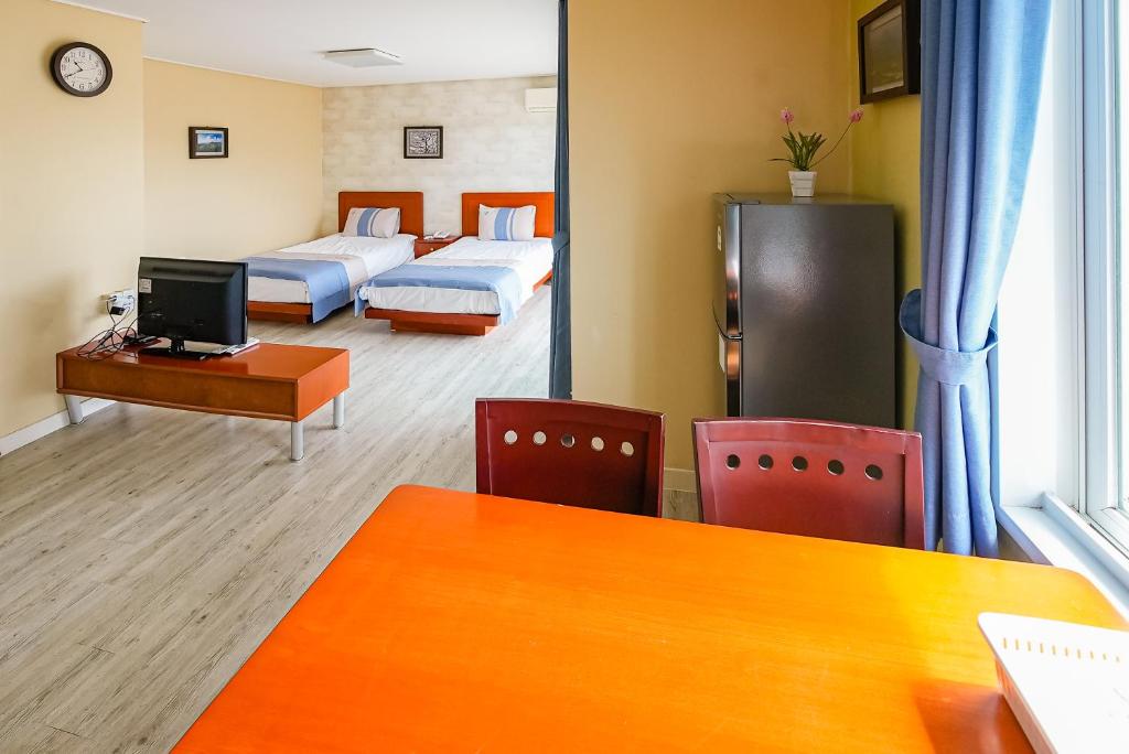 Postel nebo postele na pokoji v ubytování Mega Resort