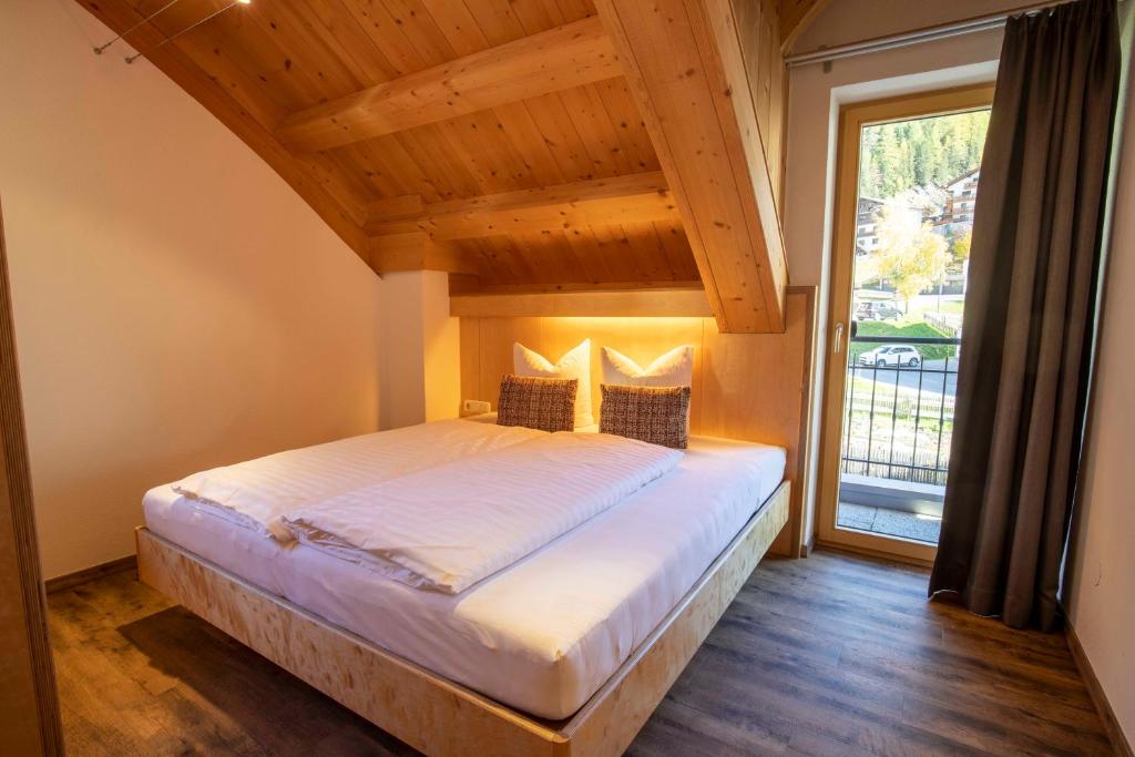 Posteľ alebo postele v izbe v ubytovaní Kirchwirt Appartements