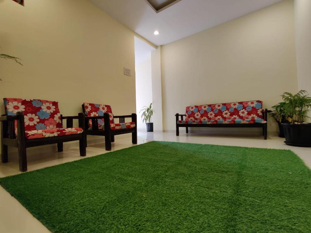 Posezení v ubytování Hotel Nisarg