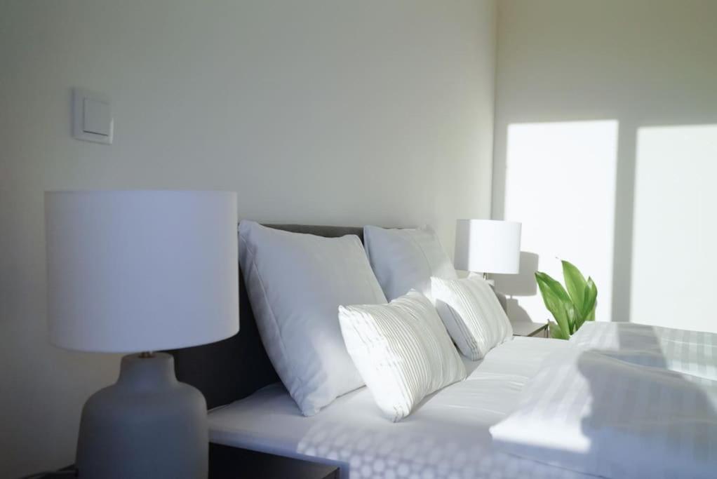 Posteľ alebo postele v izbe v ubytovaní Oberlaa New Apartment - 15 Min to City