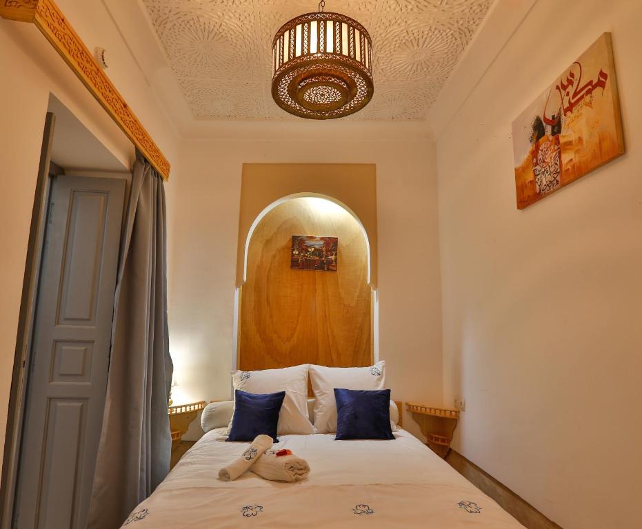 Postel nebo postele na pokoji v ubytování Riad Alech