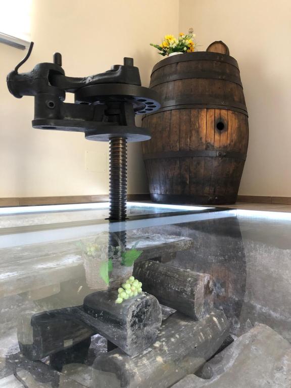 a table with a gun and a tank at Etna holiday in Zafferana Etnea