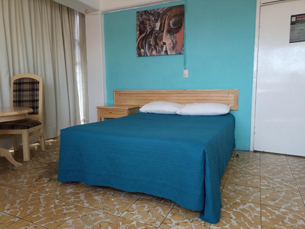 Postel nebo postele na pokoji v ubytování Hotel Viena