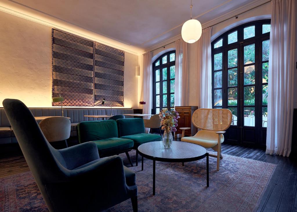 Can Bordoy Grand House Hotel GL Preferred Hotel的休息区