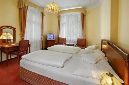 Postel nebo postele na pokoji v ubytování Hotel Saint Antonius