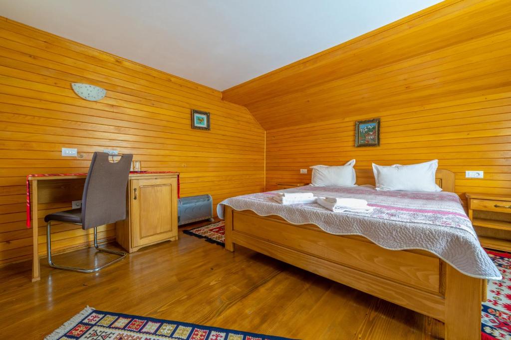 Postel nebo postele na pokoji v ubytování Cabana TYF - Dreptu