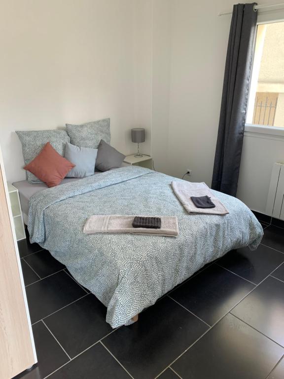 Posteľ alebo postele v izbe v ubytovaní Villa Tenjin chambre 5