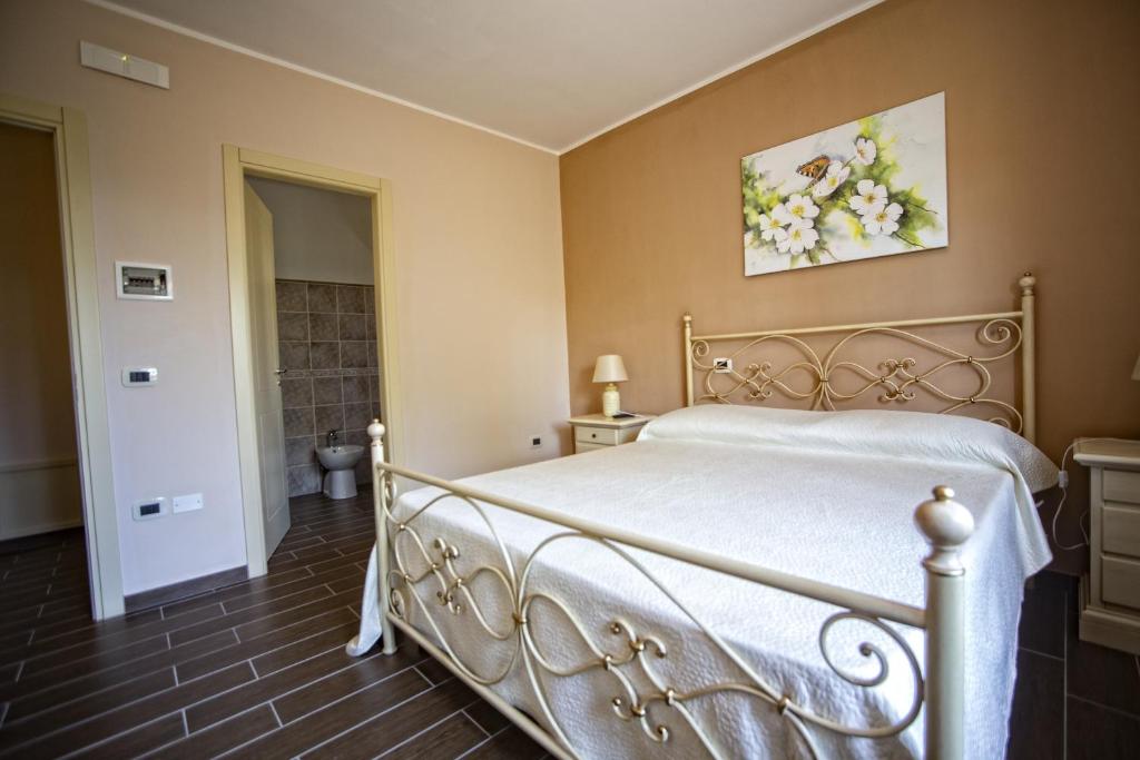 Posteľ alebo postele v izbe v ubytovaní B&B MALVETUM