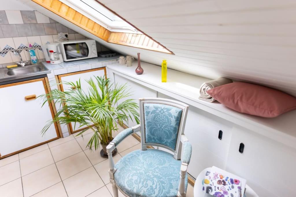 Kuchyňa alebo kuchynka v ubytovaní Studio sous les étoiles au coeur de Jaurès
