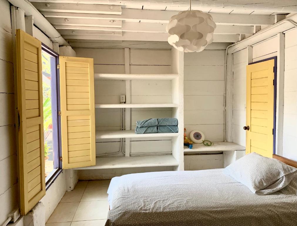 Voodi või voodid majutusasutuse Casita Caribe en reserva natural, playa privada, kayaks, wifi, aire acondicionado toas