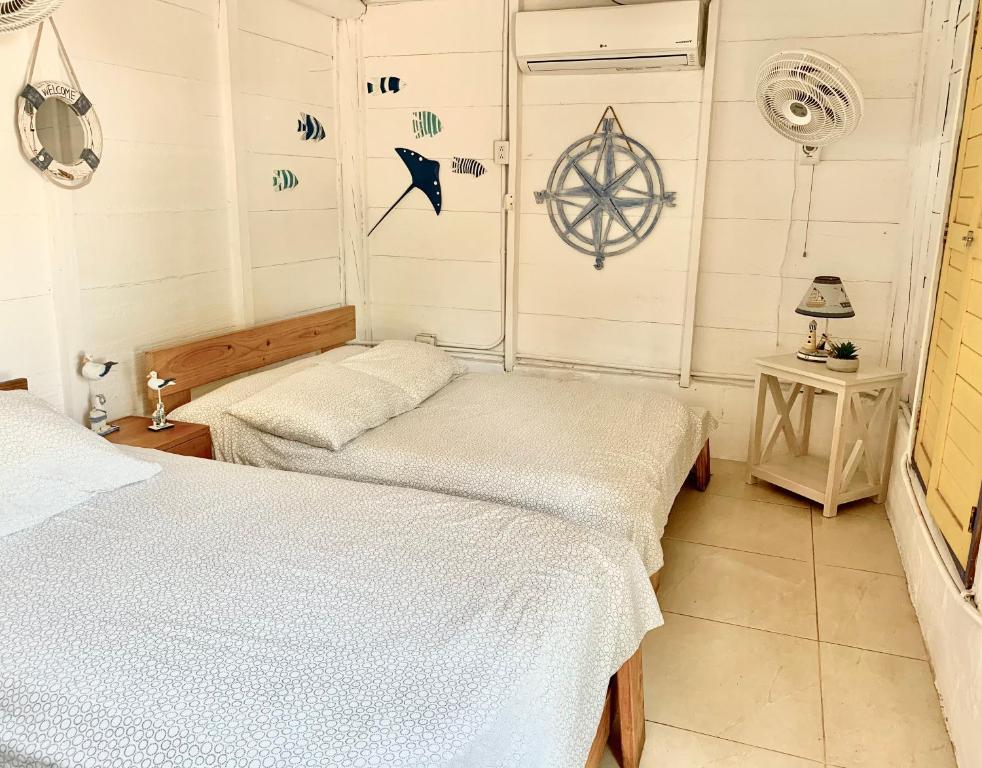 Voodi või voodid majutusasutuse Casita Caribe en reserva natural, playa privada, kayaks, wifi, aire acondicionado toas