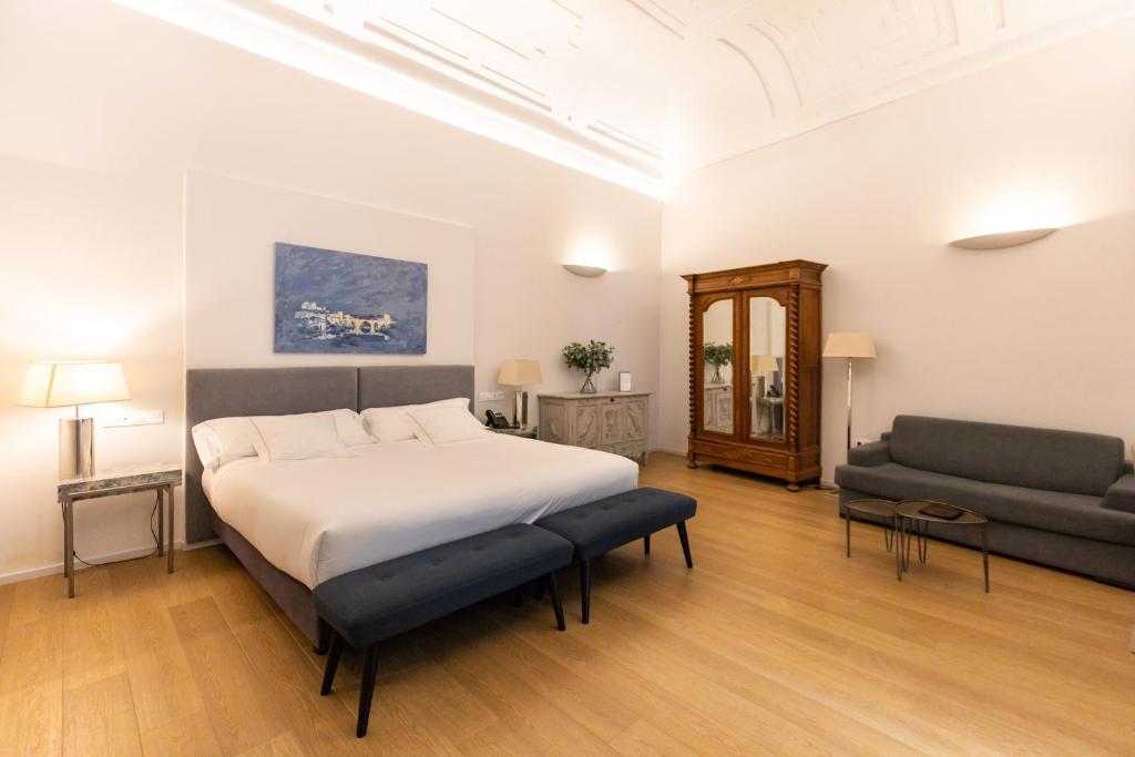 Postel nebo postele na pokoji v ubytování Hotel Boutique Posada de Sillería