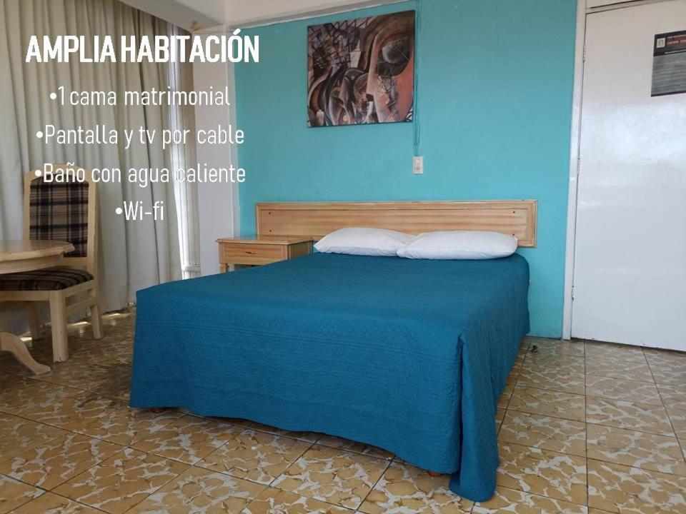 Postel nebo postele na pokoji v ubytování Hotel Viena