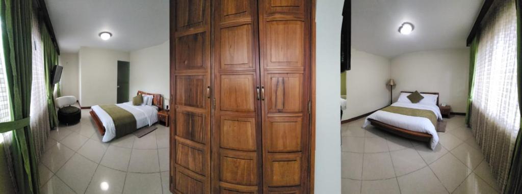 Postel nebo postele na pokoji v ubytování Apartahotel Vincent Suites