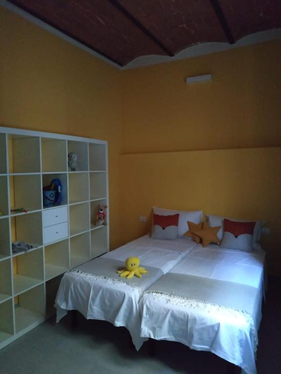 Posteľ alebo postele v izbe v ubytovaní Casa antica Maremma Toscana