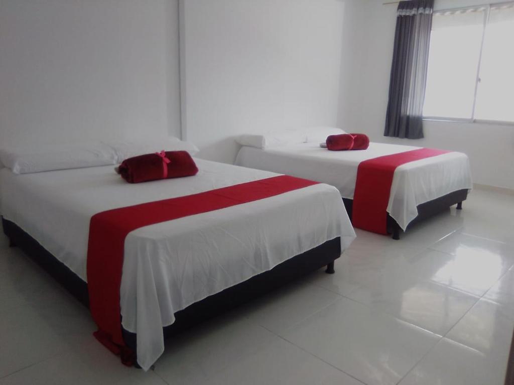 A bed or beds in a room at MIRADORES D ALESSANDRA