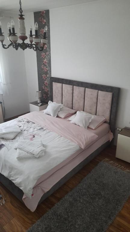 Postel nebo postele na pokoji v ubytování Apartman Hakuna Matata