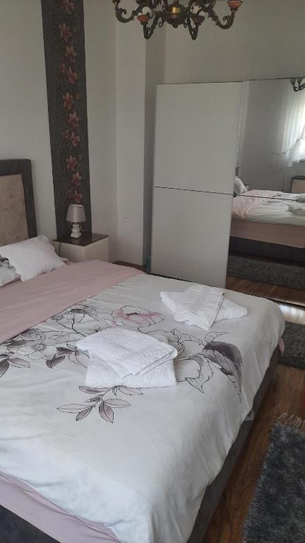 Postel nebo postele na pokoji v ubytování Apartman Hakuna Matata