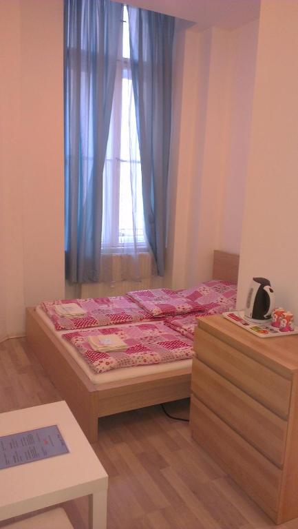Posteľ alebo postele v izbe v ubytovaní Apartman 4 you