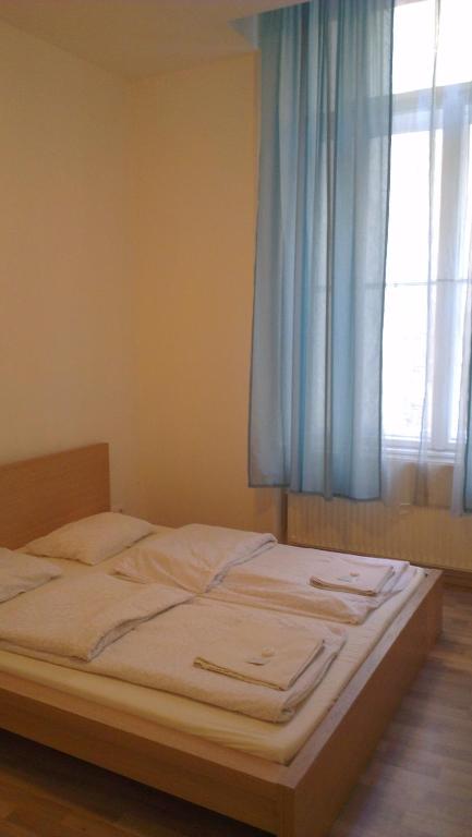 Posteľ alebo postele v izbe v ubytovaní Apartman 4 you