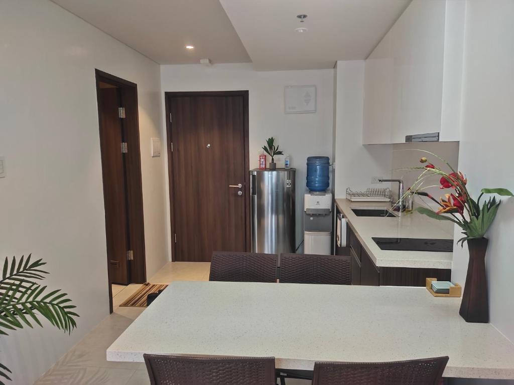 Kuchyň nebo kuchyňský kout v ubytování Tambuli Residence