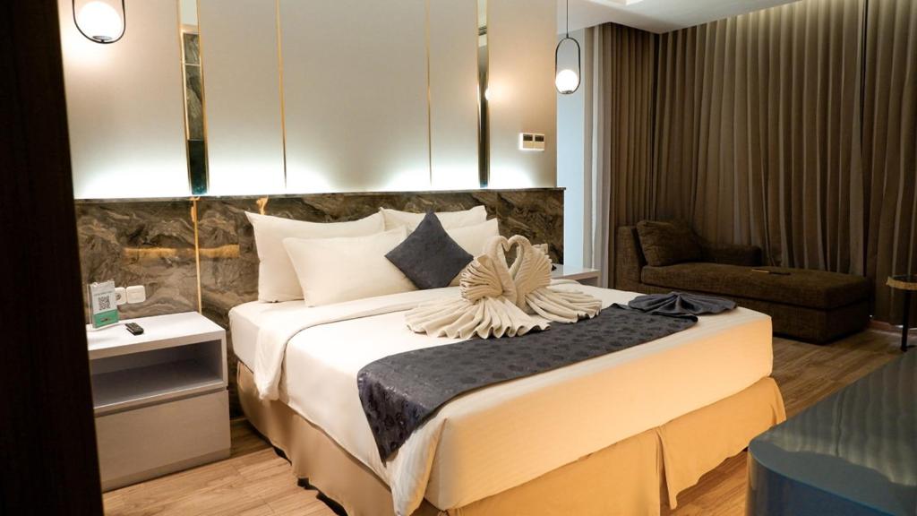 Hotel Ayola Sunrise Mojokerto - Housity