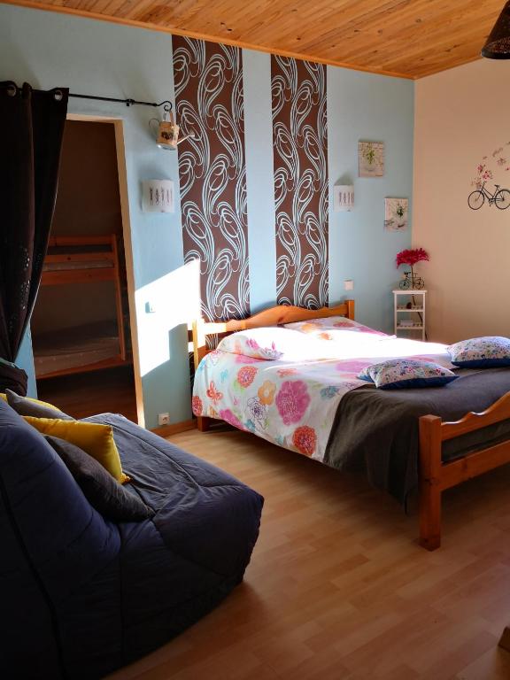 Postel nebo postele na pokoji v ubytování Hotel Ô Fil de L'ô
