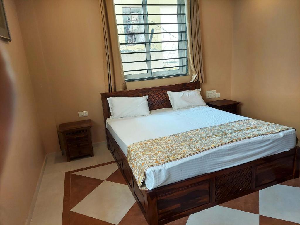 Llit o llits en una habitació de Gems Suites-A Boutique Stay