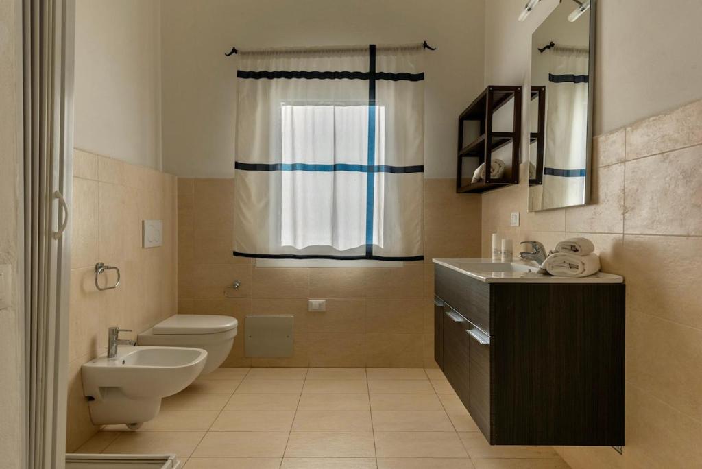 Łazienka w obiekcie Residence con piscina a 4 km da Baja Sardinia