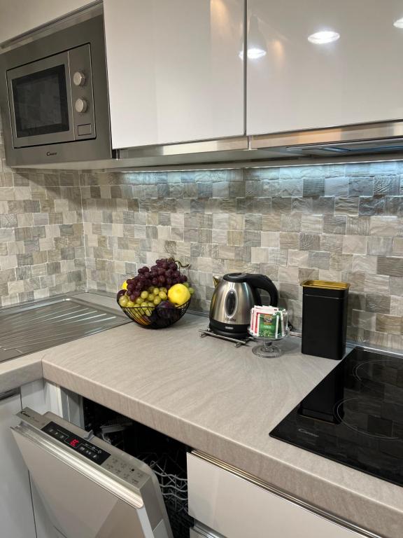 A kitchen or kitchenette at Residenza N&D Luxury
