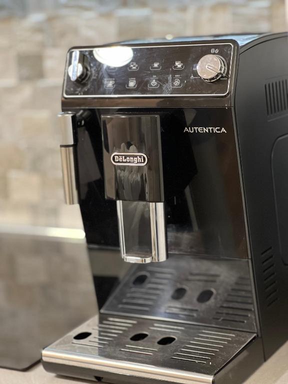 Coffee and tea making facilities at Residenza N&D Luxury