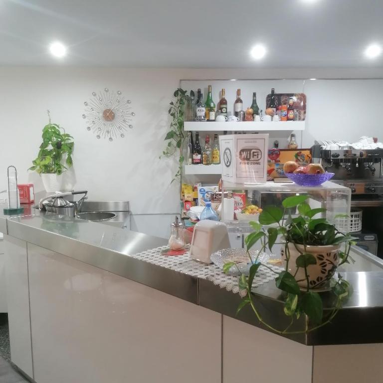 Kuchyň nebo kuchyňský kout v ubytování Piccolo Hotel Lamezia